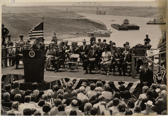 President Nixon gives a speech with the Verdigris River and river vessels in the background on June 5, 1971.